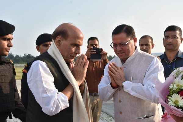 Cm dhami welcomed rajnath singh on jauli grant airport uttrakhand