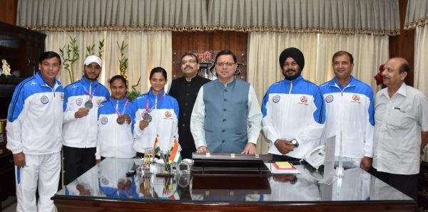 Cm Dhami honored national games winner at cm house