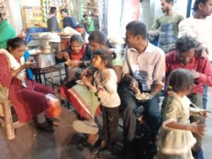 Social worker Kamal help blind men's group at Har ki Paudi