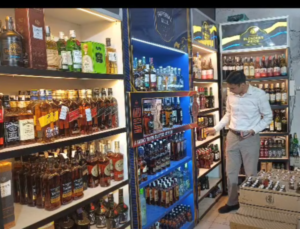IAS Savin Bansal - wine shopkeeper sailed overrate wine to DM Dehradun